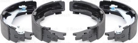 BOSCH 0 986 487 779 - Kit ganasce, Freno stazionamento www.autoricambit.com